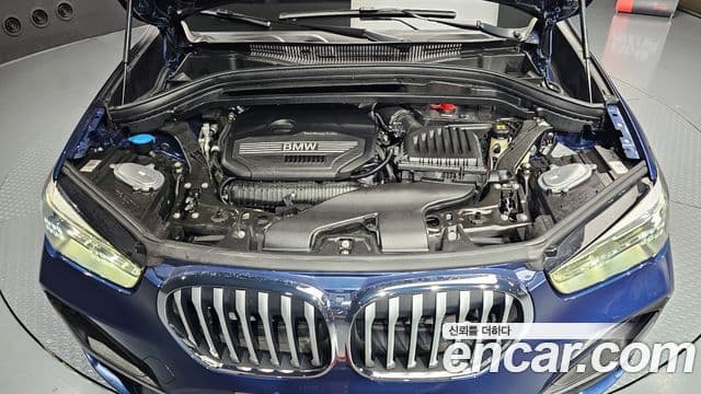 BMW X1 2021 — ფოტო 6/20