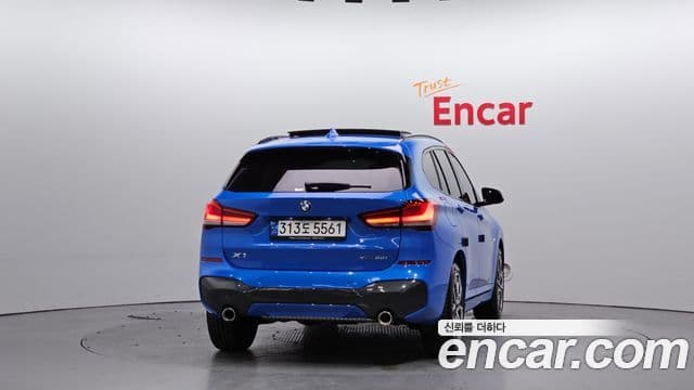 BMW X1 2022 — ფოტო 4/20