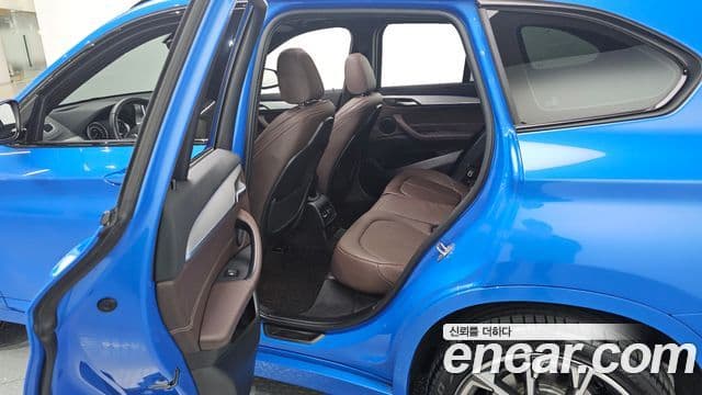 BMW X1 2022 — ფოტო 12/20