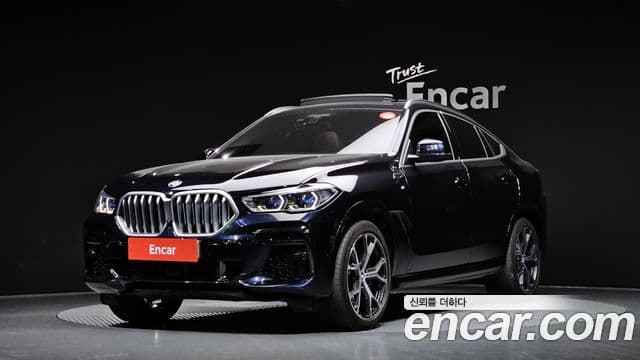 BMW X6 2021 — Фото 1/20