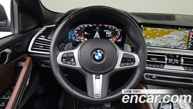 BMW X6 2023 — ფოტო 13/20