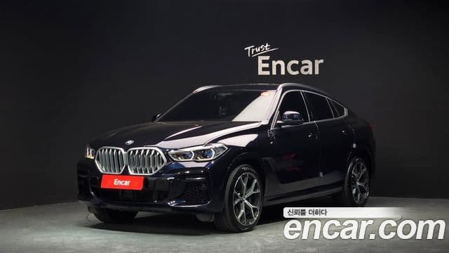 BMW X6 2022 — Фото 1/20