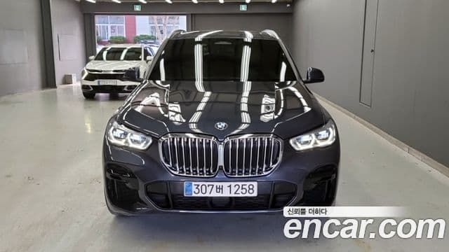 BMW X5 2022 — ფოტო 1/17