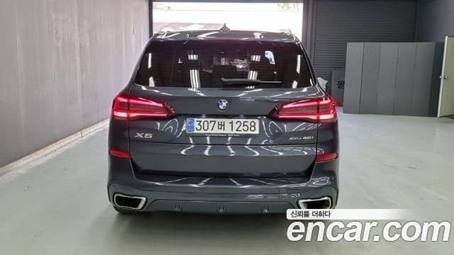 BMW X5 2022 — ფოტო 4/17