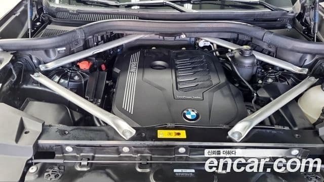 BMW X5 2022 — ფოტო 6/17