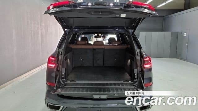 BMW X5 2022 — ფოტო 15/17