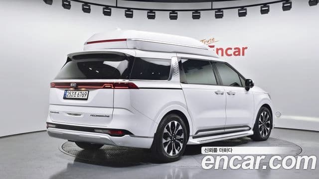 Kia Carnival 2021 — ფოტო 4/20