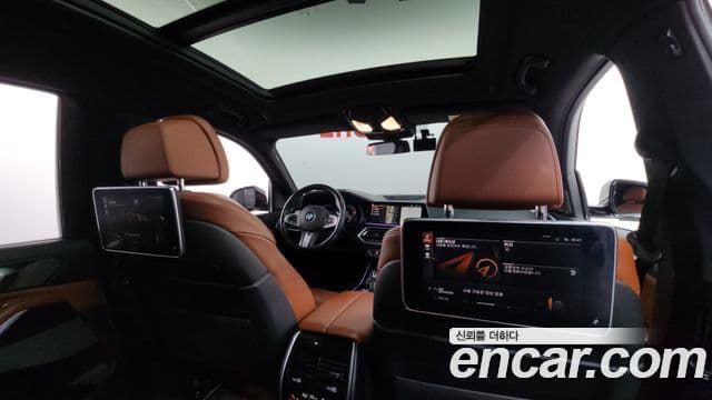 BMW X7 2021 — ფოტო 19/20