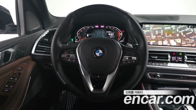 BMW X5 2023 — ფოტო 13/20