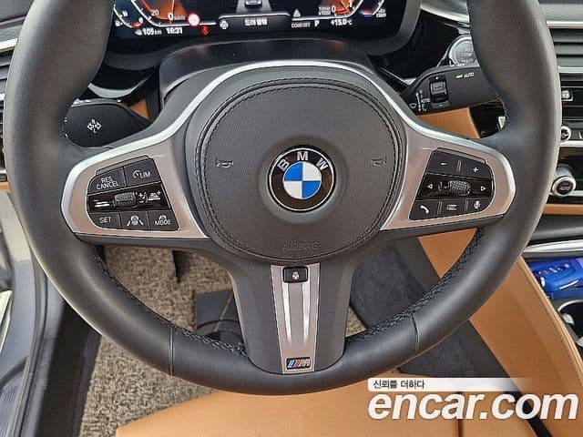 BMW 5 Series 2023 — Фото 14/20
