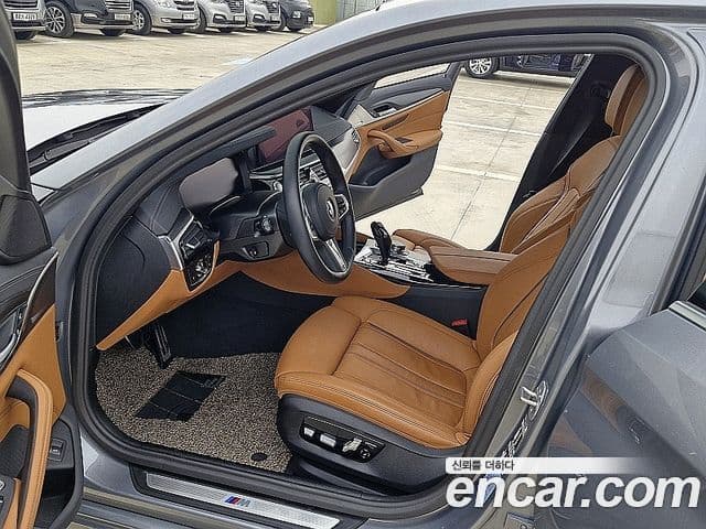 BMW 5 Series 2023 — Фото 15/20