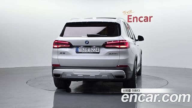 BMW X5 2022 — ფოტო 4/20
