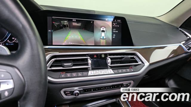 BMW X5 2022 — ფოტო 15/20