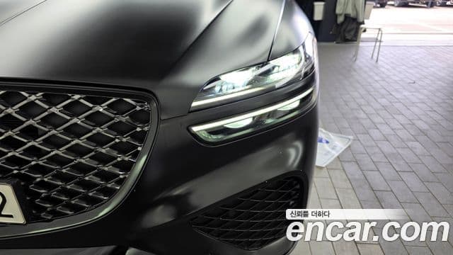 Genesis GV70 2021 — ფოტო 31/34