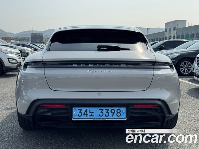 Porsche Taycan 2024 — Photo 1/20
