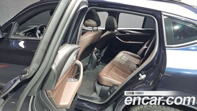 BMW X4 2021 — ფოტო 13/20