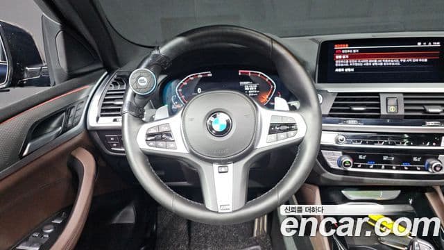 BMW X4 2021 — ფოტო 14/20