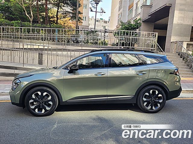 Kia Sportage 2023 — Фото 1/20