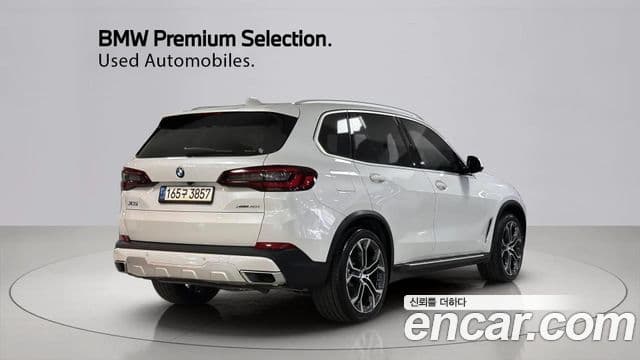 BMW X5 2022 — ფოტო 15/20