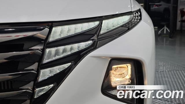 Hyundai Tucson Hybrid 2021 — ფოტო 23/30