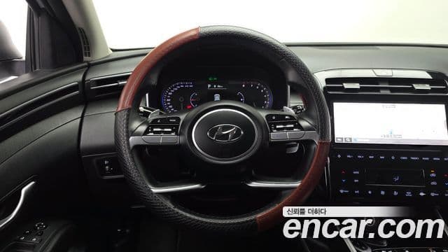 Hyundai Tucson Hybrid 2021 — Photo 24/30