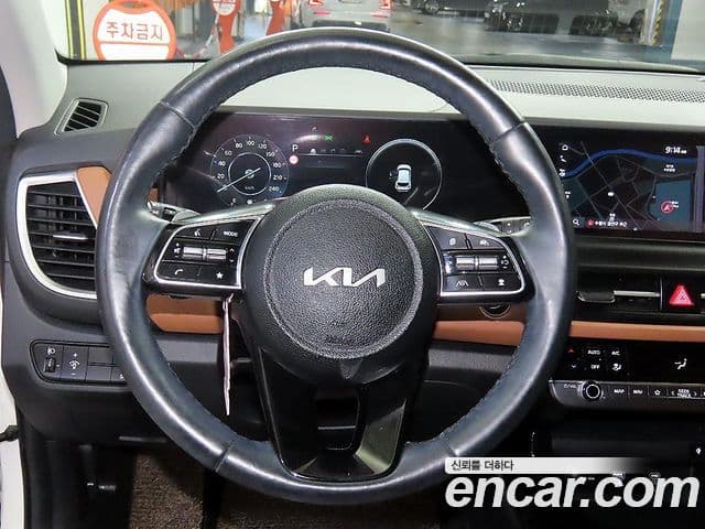 Kia Seltos 2023 — ფოტო 11/18
