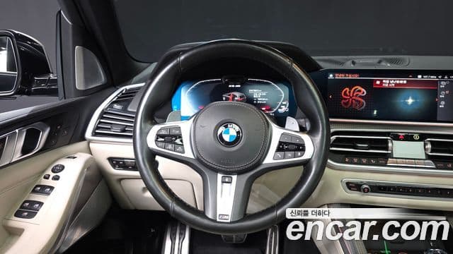 BMW X5 2021 — ფოტო 13/20
