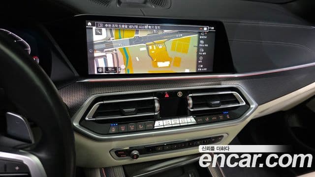BMW X5 2021 — ფოტო 14/20
