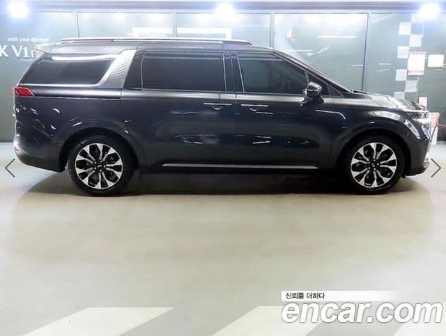 Kia Carnival 2021 — Фото 1/19