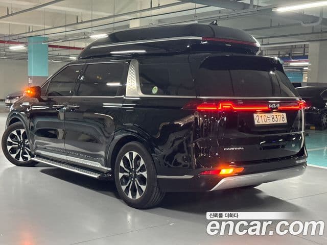 Kia Carnival 2021 — ფოტო 4/20