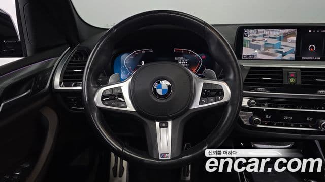 BMW X3 2021 — ფოტო 13/20