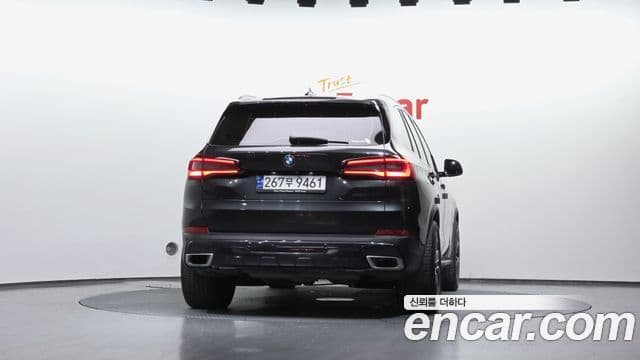 BMW X5 2023 — ფოტო 4/20
