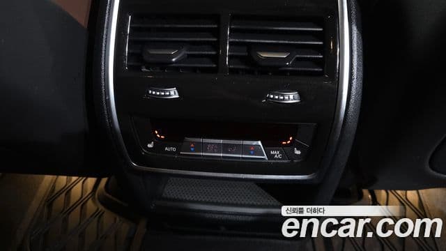 BMW X5 2023 — ფოტო 18/20