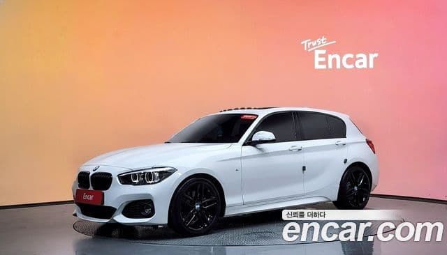 BMW 1 Series 2018 — ფოტო 1/20