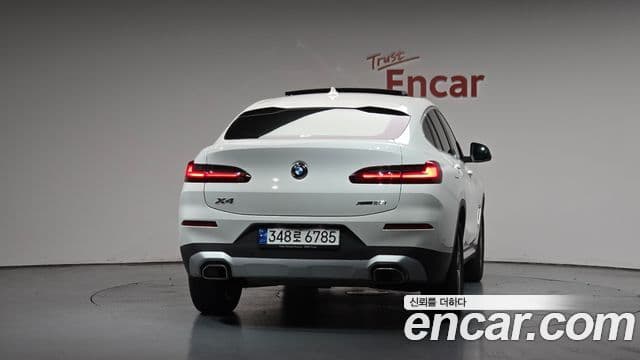 BMW X4 2023 — ფოტო 4/20