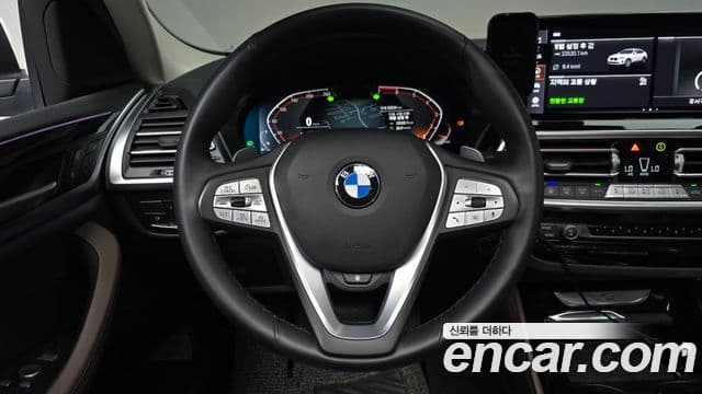 BMW X4 2023 — ფოტო 13/20