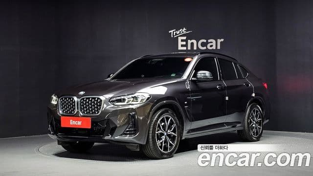 BMW X4 2022 — Фото 1/20