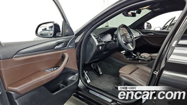 BMW X4 2022 — Фото 10/20