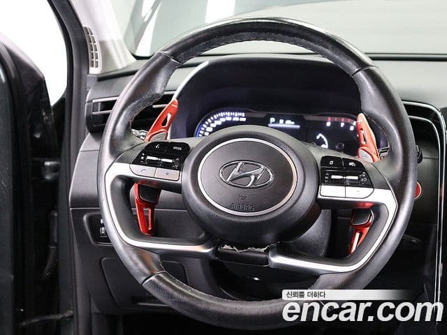 Hyundai Tucson Hybrid 2021 — ფოტო 18/20