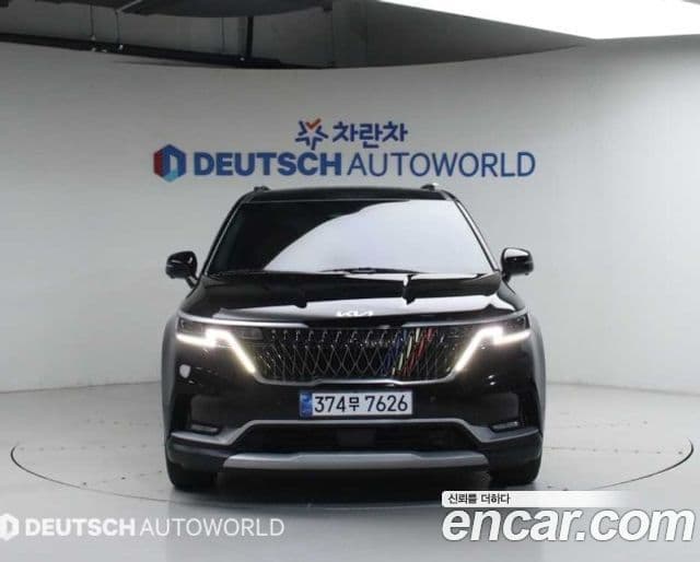 Kia Carnival 2023 — ფოტო 2/20
