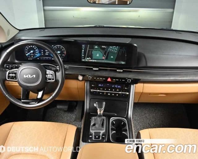 Kia Carnival 2023 — ფოტო 6/20