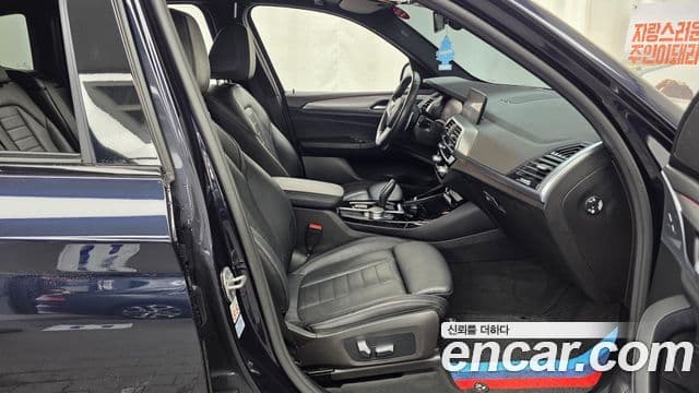 BMW X3 2021 — ფოტო 14/31