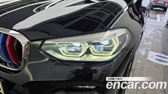 BMW X3 2021 — ფოტო 23/31