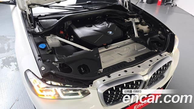 BMW X4 2023 — ფოტო 6/20