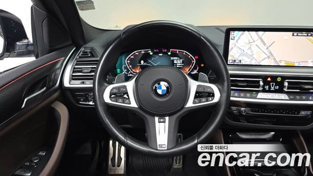 BMW X4 2023 — ფოტო 13/20