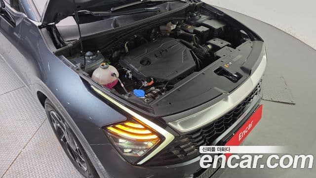 Kia Sportage 2023 — ფოტო 6/20