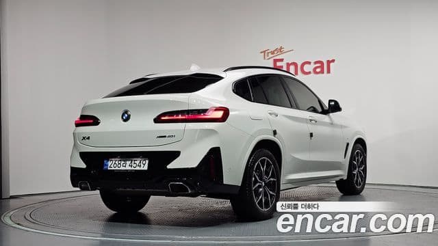 BMW X4 2023 — Фото 2/20