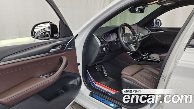 BMW X4 2023 — Фото 10/20