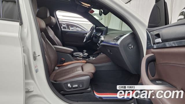 BMW X4 2023 — Фото 11/20