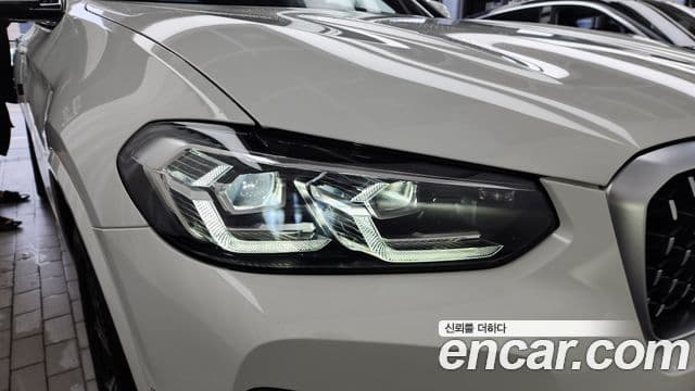 BMW X4 2023 — Photo 19/36